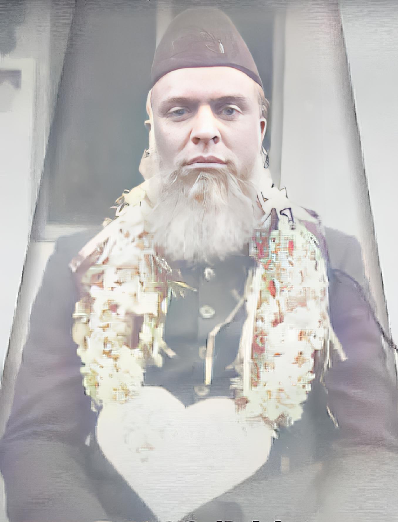 Bhaijaan Rahmani Sitting in Chair